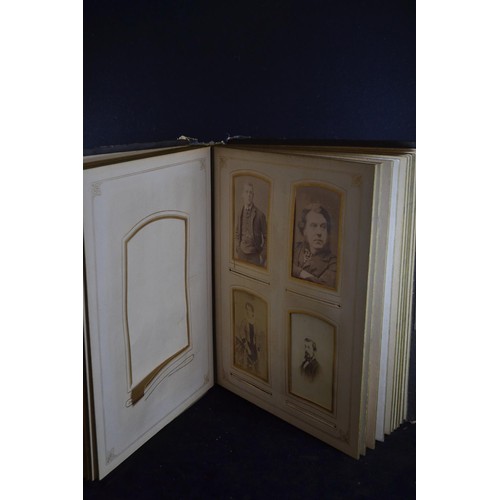 503 - Three late Victorian to Edwardian and possibly later photograph albums, including two leather bound ... 