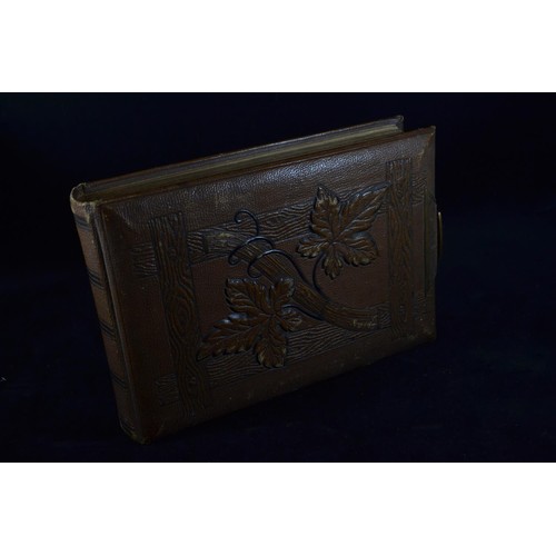 503 - Three late Victorian to Edwardian and possibly later photograph albums, including two leather bound ... 