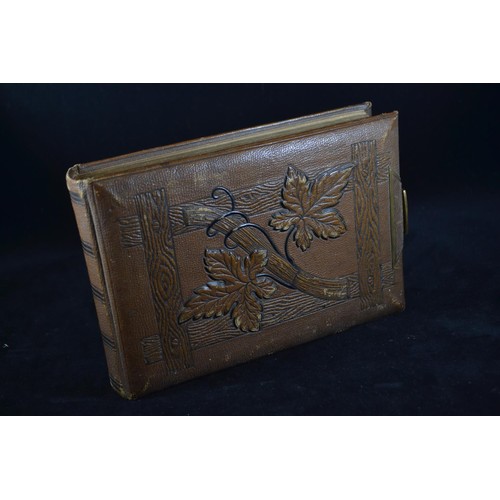 503 - Three late Victorian to Edwardian and possibly later photograph albums, including two leather bound ... 