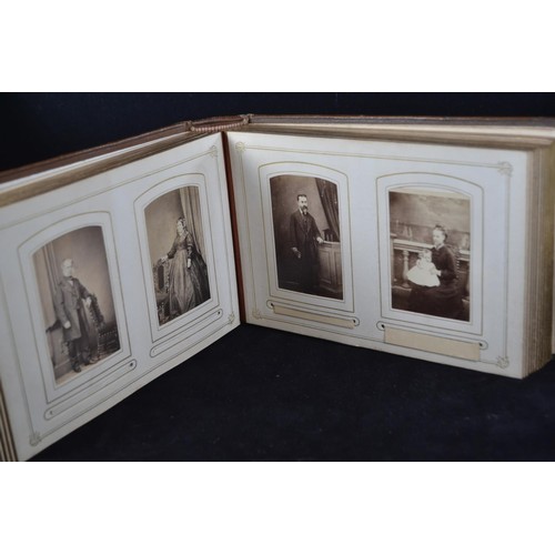 503 - Three late Victorian to Edwardian and possibly later photograph albums, including two leather bound ... 