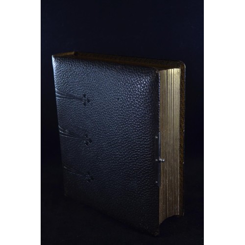 503 - Three late Victorian to Edwardian and possibly later photograph albums, including two leather bound ... 