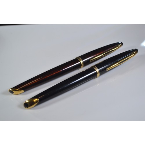 280 - Two Waterman fountain pens both with 18ct nibs.