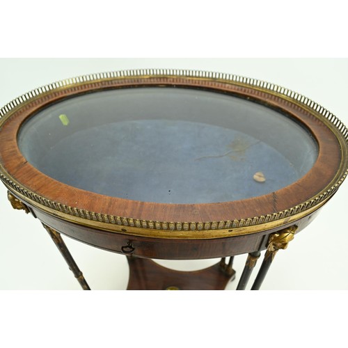 516 - Period Oval bijouterie display table with bamboo style support and claw feet. Blue velvet lining wit... 