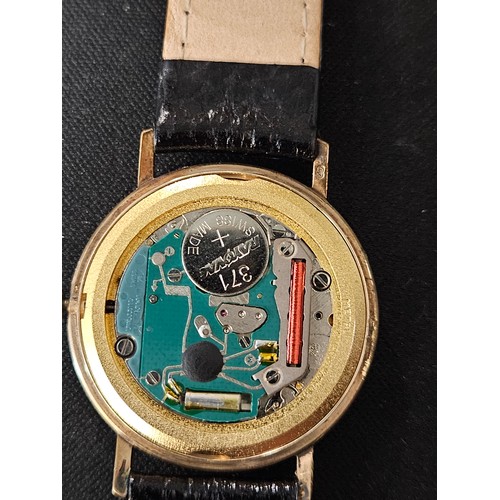 55 - Marvin Revue 9ct Quartz gents wrist watch date aperture with leather strap in original box. gross we... 