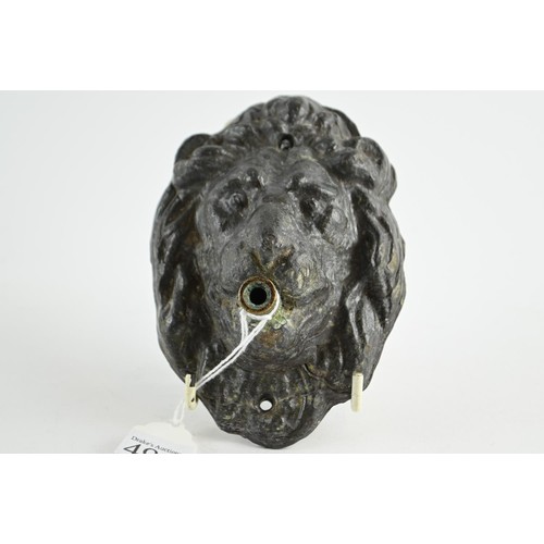 490 - Antique heavy lead Lion head water feature . H 14cm