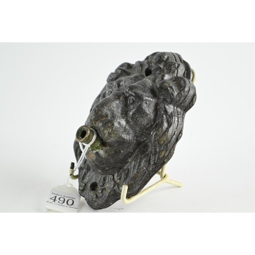 490 - Antique heavy lead Lion head water feature . H 14cm