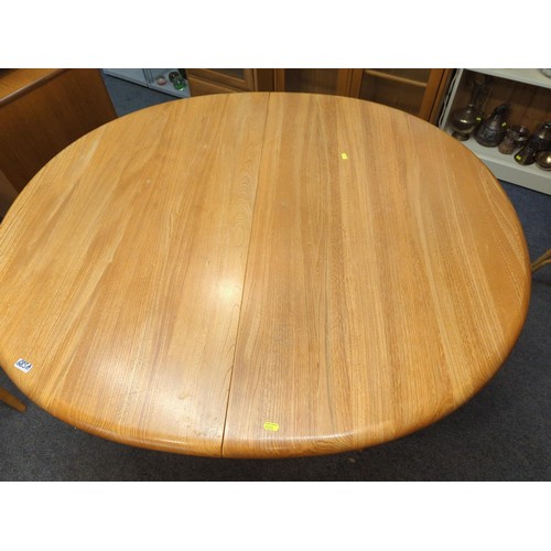 683A - Ercol 788 Old Colonial extending pedestal table. L(open)165cm L(closed)115cm W115cm H73cm