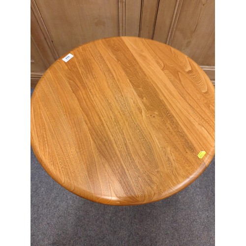 684 - Ercol  circular occasional table 1062 DMW22113 with glazed lower shelf D60cm H63cm