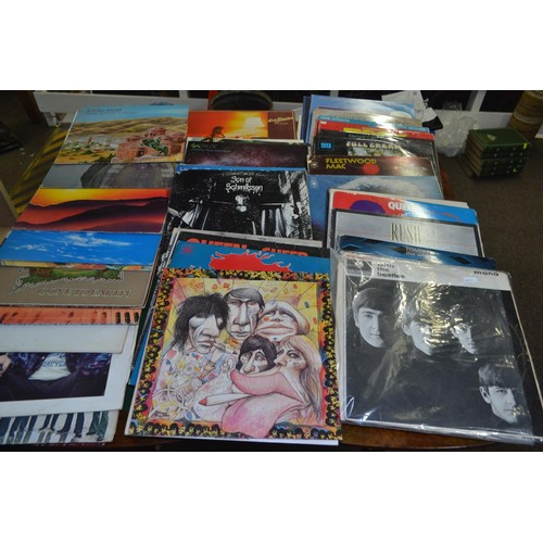 520A - Collection of 50 long playing vinyl albums, inc. The Beatles, The Who, Graham Parker and the Rumour,... 