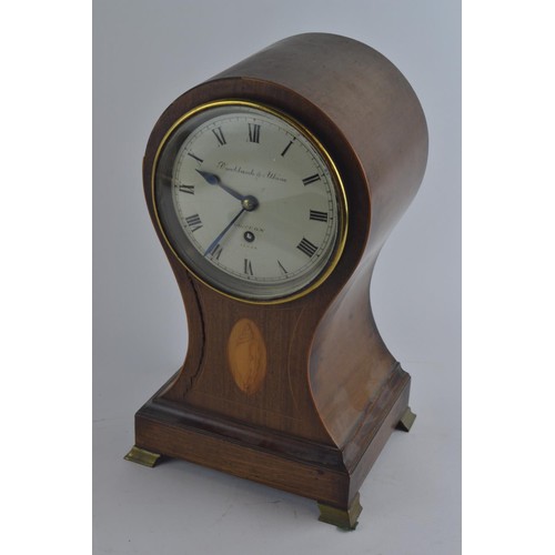 549 - Brockbank & Atkins London mantle clock, numbered 12489, with pendulum, hardwood with tulip-shape... 