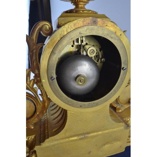 554 - Large ornate heavily gilded mantel clock with painted porcelain panels and face, marked PH Morey to ... 