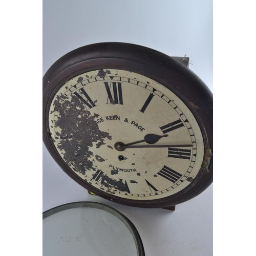 556 - Late C19 wall clock, dial heavily worn made by Page Keen and Page Plymouth. Dia 38 D15