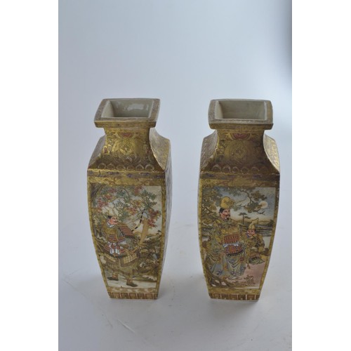 558 - A pair of late C19th/early C20th Japanese Satsuma square section vases with painted and gilt panels ... 