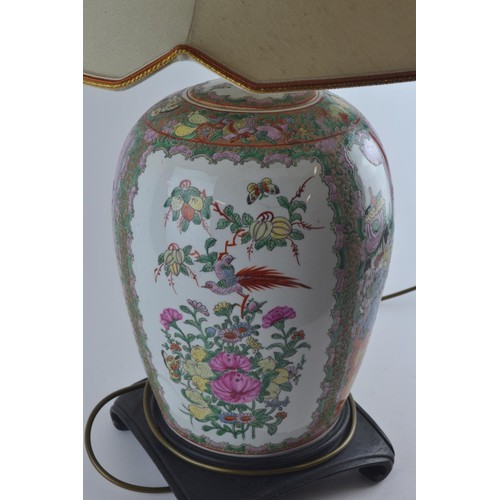 561 - Large C20th Chinese famille rose ginger jar converted to a table lamp, four panel decoration depicti... 