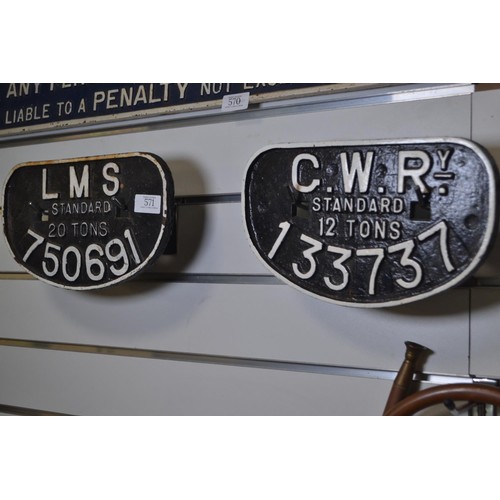 571 - Two cast iron D-shaped train wagon plates, including 'LMS standard 20 tons 750691' and 'G.W.Ry. stan... 