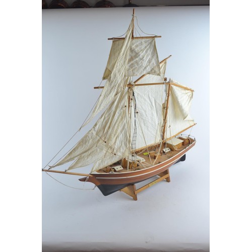 574 - La Belle Poule model Ketch sailing yacht with calico sails and display stand. Overall length 82 cm T... 