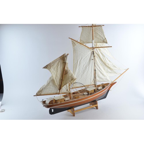 574 - La Belle Poule model Ketch sailing yacht with calico sails and display stand. Overall length 82 cm T... 