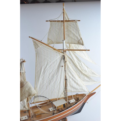 574 - La Belle Poule model Ketch sailing yacht with calico sails and display stand. Overall length 82 cm T... 