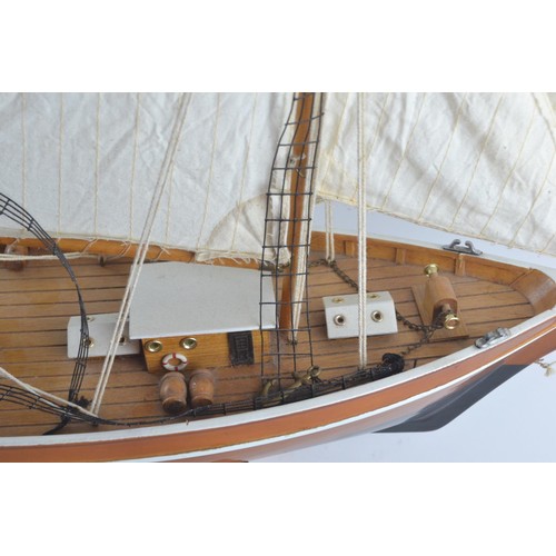 574 - La Belle Poule model Ketch sailing yacht with calico sails and display stand. Overall length 82 cm T... 