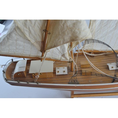 574 - La Belle Poule model Ketch sailing yacht with calico sails and display stand. Overall length 82 cm T... 