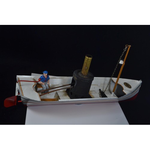 575 - Toucher Walther African Queen model steam boat with original model skipper. L37 H18