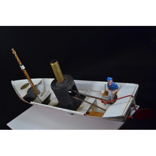 575 - Toucher Walther African Queen model steam boat with original model skipper. L37 H18