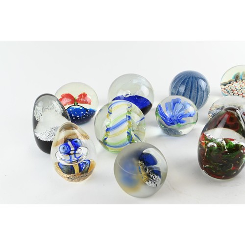 604 - Collection of thirteen paperweights inc. millefiori with latticino star design, some signed