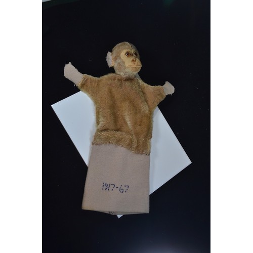 577A - Three vintage children's items. Hand puppet monkey, Mechanical wind up Bear marked with ALPS foreign... 