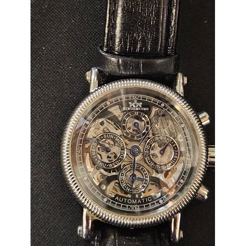 72 - Hindenberg skeleton gents watch and leather strap. Model 150-H automatic movement calibre 35 jewels.