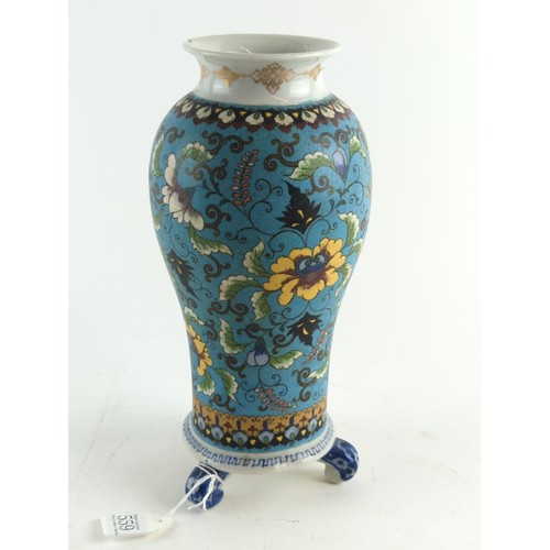 559 - A three footed Japanese porcelain cloisonné style vase decorated with floral motifs on a turquoise g... 