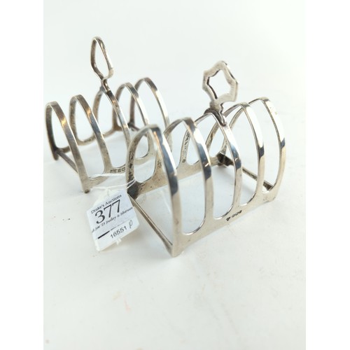 377 - Two small silver toast racks, including: Harrods Ltd Sheffield 1932 and Barker Brothers Silver ... 