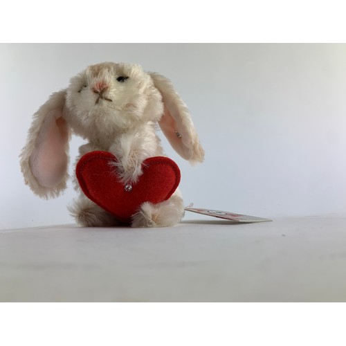 576C - Steiff rabbit with heart, 033506, seated rabbit holding a red felt heart embellished with a single s... 