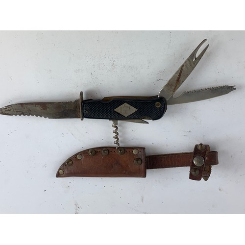 495 - Kukri Knife L41cm complete with leather scabbard and both small skinning knives, Hunting knife L23cm... 