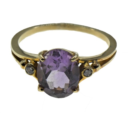 121 - 15ct gold ring set with amethyst and white stones, size P, gross weight 3.4 grams