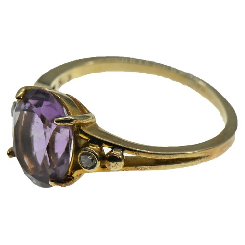 121 - 15ct gold ring set with amethyst and white stones, size P, gross weight 3.4 grams