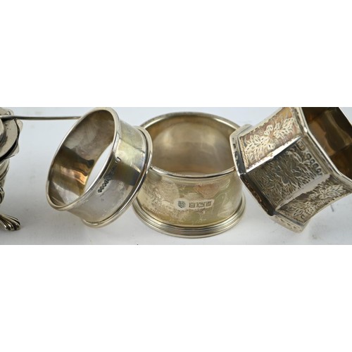 327A - Victorian silver glass lined mustard pot with spoon and three silver napkin rings, various maker's a... 