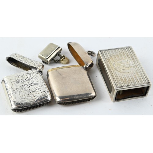 331A - Two silver vestas, Birmingham 1899 and 1903 respectively, a silver matchbox cover, Chester 1901, and... 