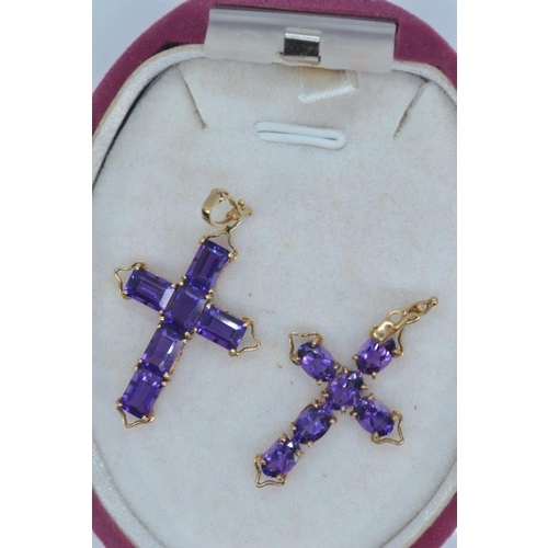 216 - Two 14ct gold and amethyst cross pendants, 39mm length, gross weight 3.62 grams