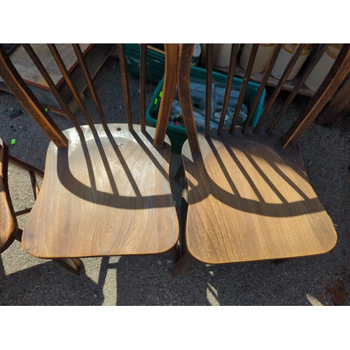 235 - 5 stickback elm seated kitchen chairs. One with missing stick.