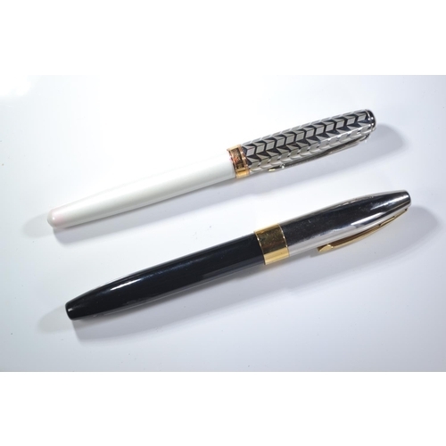 286 - Two fountain pens, Parker Sonnet metal and pearl with 18k nib and Sheaffer fountain pen with 18k nib... 