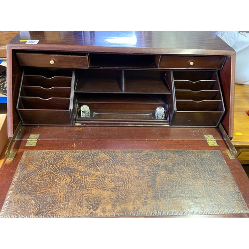 392 - Vintage writing bureau with original leather writing area, Three drawers and locking drop down front... 