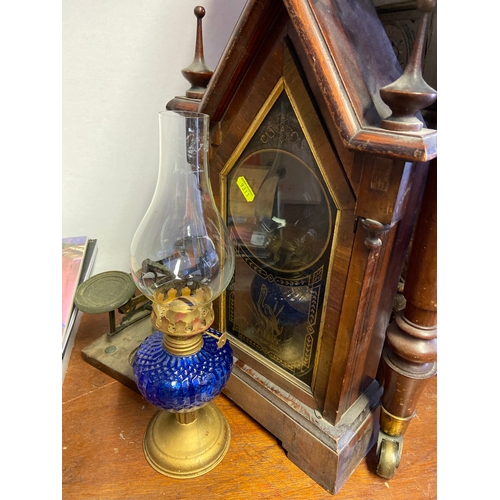 395 - Small set of brass scales , an ornate oil lamp and a wooden clock case.