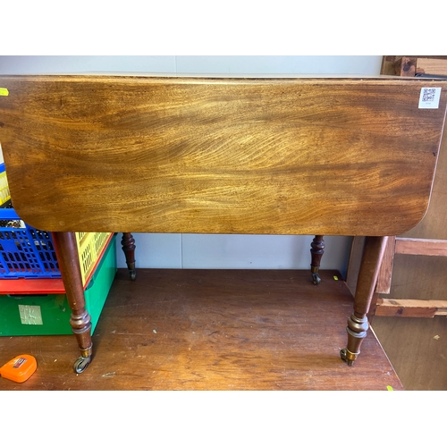 399 - Double leaf folding occasional table with single drawer and casters on turned legs. W81.5 D 52.5/ 11... 