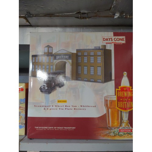 297 - Two boxed Lledo Days Gone By ltd ed building sets, including British Railways and Whitbread Brewery