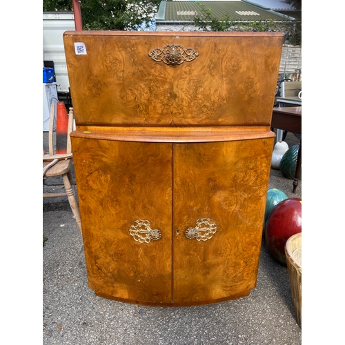 430 - Vintage cocktail cabinet with ornate handles and decorative interior. W71cm D42cm H111cm