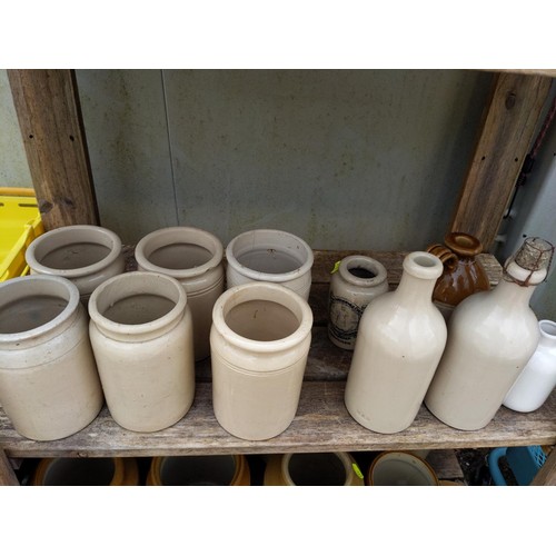 141 - quantity of stoneware jars and bottles in different sizes 