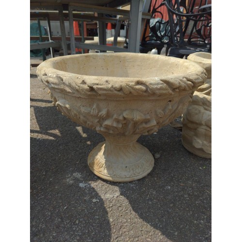 52 - Two pedestal fleur de lys decorated planters D54cm x H41cm