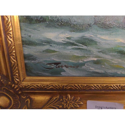 547 - Oil on canvas signed Stevens of a coastal scene in a gilt frame. 34cm x 29cm inclusive of frame.