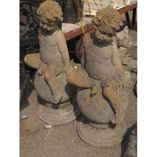 69 - Pair of Concrete Cherubs sitting on balls H65cm 