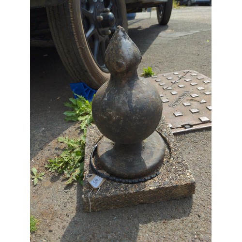 85 - Metal finial on concrete base H38cm